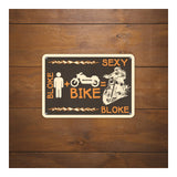 Oxford Garage Metal Sign: Bloke + Bike = Sexy Bloke