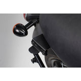 Adapter for SLC side carrier left. For Bonneville T100/120 (15-) w/o pass. grab rail. (HTA.11.743.12001)
