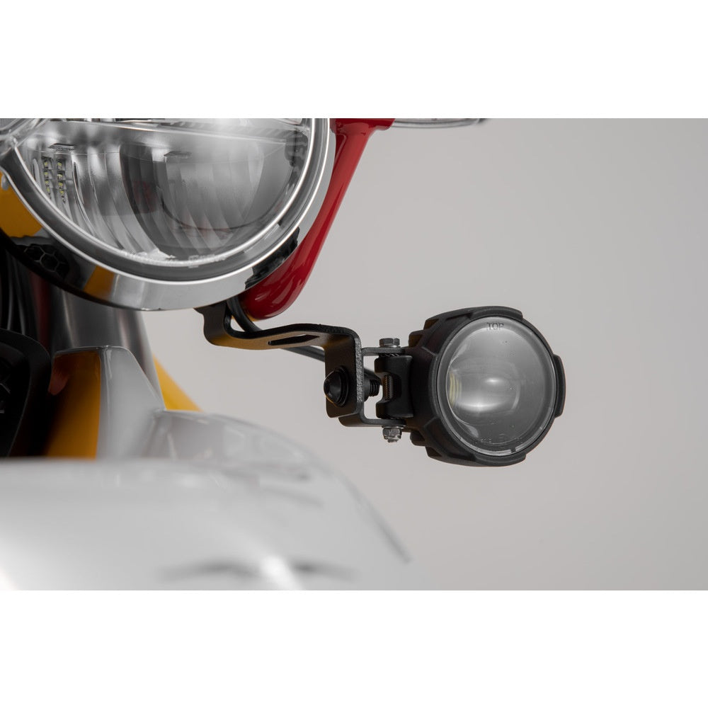 Light mounts.Black. Moto Guzzi V85 TT (19-).(NSW.17.925.10000/B)